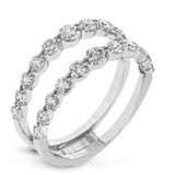 This 18k white gold engagement set certainly makes a statement with 1.72 ctw of white diamonds set in three rows.