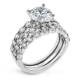 This 18k white gold engagement set certainly makes a statement with 1.72 ctw of white diamonds set in three rows.