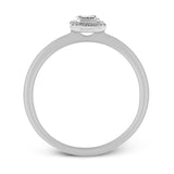 This exquisite, minimalist yellow gold ring features a halo containing .04 ctw of round white diamonds encircling a .16 ctw emerald cut white diamond