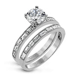 This sleek, minimalist white gold wedding set features a distinctive design with an impressive 1.05 ctw of baguette shaped white diamonds.
