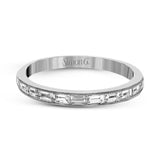 This sleek, minimalist white gold wedding set features a distinctive design with an impressive 1.05 ctw of baguette shaped white diamonds.