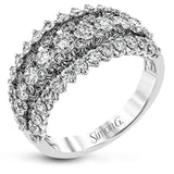 This unique white gold ring features a total of 1.74 ctw of white diamonds in an intricately designed setting.