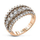 This unique white gold ring features a total of 1.74 ctw of white diamonds in an intricately designed setting.