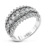 This unique white gold ring features a total of 1.74 ctw of white diamonds in an intricately designed setting.