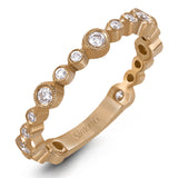 This lovely 18k rose gold band showcases varied sizes of round white diamonds that total .30 ctw. Perfect for stacking.