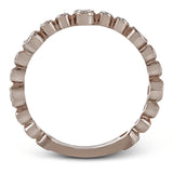 This lovely 18k rose gold band showcases varied sizes of round white diamonds that total .30 ctw. Perfect for stacking.
