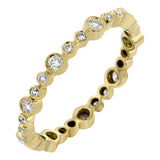 This lovely 18k yellow gold band showcases varied sizes of round white diamonds that total .30 ctw. Perfect for stacking.