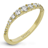 These interlocking 18k yellow gold band can be worn together with the rose and white gold bands , producing the look of one larger ring, or on their own for a simple statement. Each contains .45 ctw of shining white diamonds. Perfect for stacking.