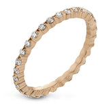 Featuring a modern stackable design, this band rose gold is accented by .40 ctw round cut white diamonds.