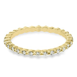 Featuring a modern stackable design, this band yellow gold is accented by .40 ctw round cut white diamonds.