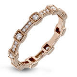 This rose gold band form a modern style band set with .33 ctw of striking round cut white diamond accents. Perfect for stacking.