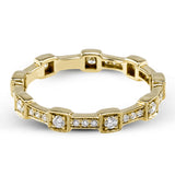 This yellow gold band form a modern style band set with .33 ctw of striking round cut white diamond accents. Perfect for stacking.