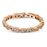 Featuring a contemporary stackable design, this rose gold band is accented by a collection of .28 ctw of white diamonds.