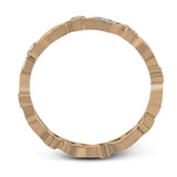 Featuring a contemporary stackable design, this rose gold band is accented by a collection of .28 ctw of white diamonds.