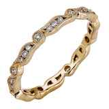 Featuring a contemporary stackable design, this  yellow gold band is accented by a collection of .28 ctw of white diamonds.