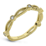 These detailed bands in 18k gold can be worn together or paired with other rings. Each one features .11 ctw of shining white diamonds. Perfect for stacking.