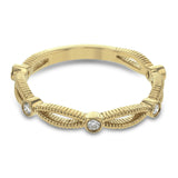 These detailed bands in 18k gold can be worn together or paired with other rings. Each one features .11 ctw of shining white diamonds. Perfect for stacking.