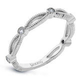 These detailed bands in 18k gold can be worn together or paired with other rings. Each one features .11 ctw of shining white diamonds. Perfect for stacking.
