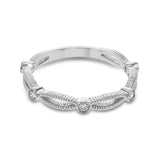 These detailed bands in 18k gold can be worn together or paired with other rings. Each one features .11 ctw of shining white diamonds. Perfect for stacking.