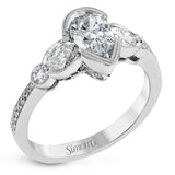 This lovely contemporary design features white gold and .14 ctw of round white diamonds and .42 ctw of oval shaped white diamonds as well as delicate milgrain edging around its centerpiece.
