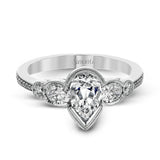 This lovely contemporary design features white gold and .14 ctw of round white diamonds and .42 ctw of oval shaped white diamonds as well as delicate milgrain edging around its centerpiece.