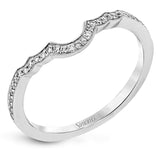 This lovely contemporary design features white gold and .14 ctw of round white diamonds and .42 ctw of oval shaped white diamonds as well as delicate milgrain edging around its centerpiece.