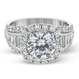 This gorgeous engagement ring makes quite the appearance with .83 ctw of round diamonds along with .83 ctw of baguette diamonds.