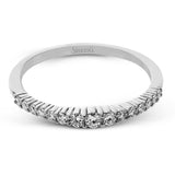 This lovely band comes in all tones of gold that can be stacked together to form one larger look, or worn separately. Each band contains .26 ctw of shining white diamonds.
