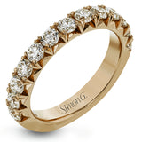 This band pairs perfectly with an engagement ring, or can be worn on its own or stacked with other rings. It contains 1.00 ctw of white diamonds.