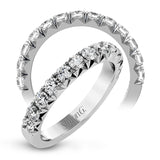 This band pairs perfectly with an engagement ring, or can be worn on its own or stacked with other rings. It contains 1.00 ctw of white diamonds.