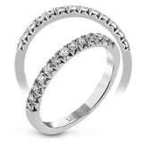 This delicate band contains .36 ctw of white diamonds which are specially set to showcase their sparkle.