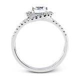 Crafted in the highest quality platinum, this engagement ring design features a two overlapping loops encircling the center stone set with .25 ctw of white diamonds.