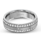 This two-tone 14k wedding band is a stunner with two rows of .50 ctw of white diamond set in rose gold along the outside, and 14k white gold on the interior.