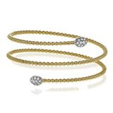 This triple twist bangle is incredibly comfortable and easy to wear, making it perfect for every occasion. A .30 ctw of white diamonds add the perfect amount of sparkle on either end. Perfect for stacking.