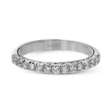 This band contains .35 ctw of white diamonds, and an interior of rose gold for a romantic touch.