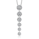 This simple, elegant white gold pendant sparkles with a total of 1.59 ctw of round white diamonds in descending clusters
