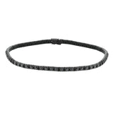 This striking bracelet glitters darkly with 3.30 ctw of black diamonds set into 14k black-rhodiumed gold.
