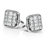 These statement stud earrings are made from 18k white gold and contains 9 smaller diamond which make up the larger look. These earrings contain .21 ctw of round diamonds, .49 ctw of princess cut diamonds, and .62 ctw of baguette diamonds.