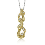 This 18k white gold pendant has a filigree design accented with vintage-inspired milgrain and .17 ctw of white round diamonds.