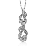This 18k white gold pendant has a filigree design accented with vintage-inspired milgrain and .17 ctw of white round diamonds.