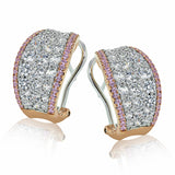 Dazzling and glamorous, these earrings sparkle with 2.37 ctw of round white diamonds and .43 ctw of yellow diamonds set in complementary two-tone gold.