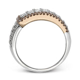 this two-tone 18k gold ring has 2.64 ctw of Simon-set princess cut diamonds along with .44 ctw of round white diamonds. The edge of the overlapping section is accented by .28 ctw of pink diamonds in rose gold.