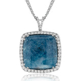 A unique opaque slice of 15.26 ct of paraiba tourmaline is surrounded by a halo of .88 ctw of white diamonds in this classic pendant design.