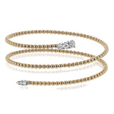 This spiral bangle look great stacked but also makes the perfect statement on its own. It contains a total of .54 ctw of white diamonds.