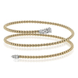 This spiral bangle look great stacked but also makes the perfect statement on its own. It contains a total of .54 ctw of white diamonds.