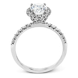 This is a classic halo design wedding set made for an oval center stone contains .72 ctw of white diamonds.