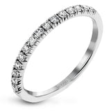 This is a classic halo design wedding set made for an oval center stone contains .72 ctw of white diamonds.
