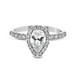 This white gold wedding set is simple yet dazzling with .71 ctw of round white diamonds framing an eye-catching pear shaped centerpiece.