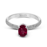 This graceful ring features .31 ctw of white diamonds set into the ring with a .90 ctw ruby.
