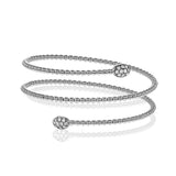This triple twist bangle is incredibly comfortable and easy to wear, making it perfect for every occasion. A .30 ctw of white diamonds add the perfect amount of sparkle on either end. Perfect for stacking.